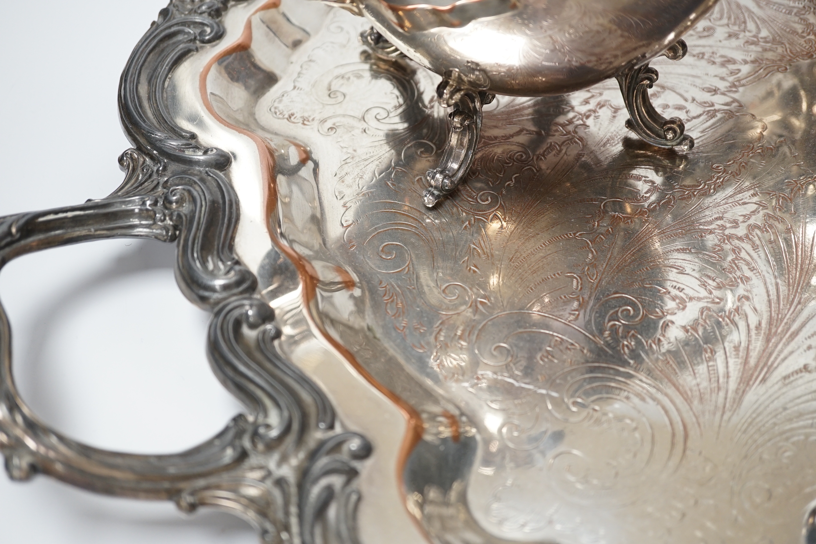 A silver plated two handled tray, a coffee and a teapot, tray 64cm wide